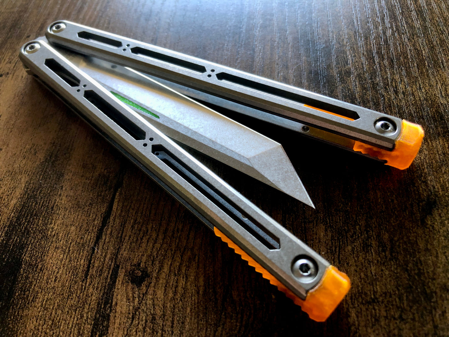 These Zippy spacers designed for the Squid Industries Hydro Balisong are made in-house from a rubbery, shatter-proof polyurethane. They add positive "sawtooth" jimping to the Hydro and are available as either full-length flush spacers for a more neutral balance, or handle extensions (with an adjustable tungsten weight system) to protect the handles from drops and increase momentum. A cosmetic blade insert is included.