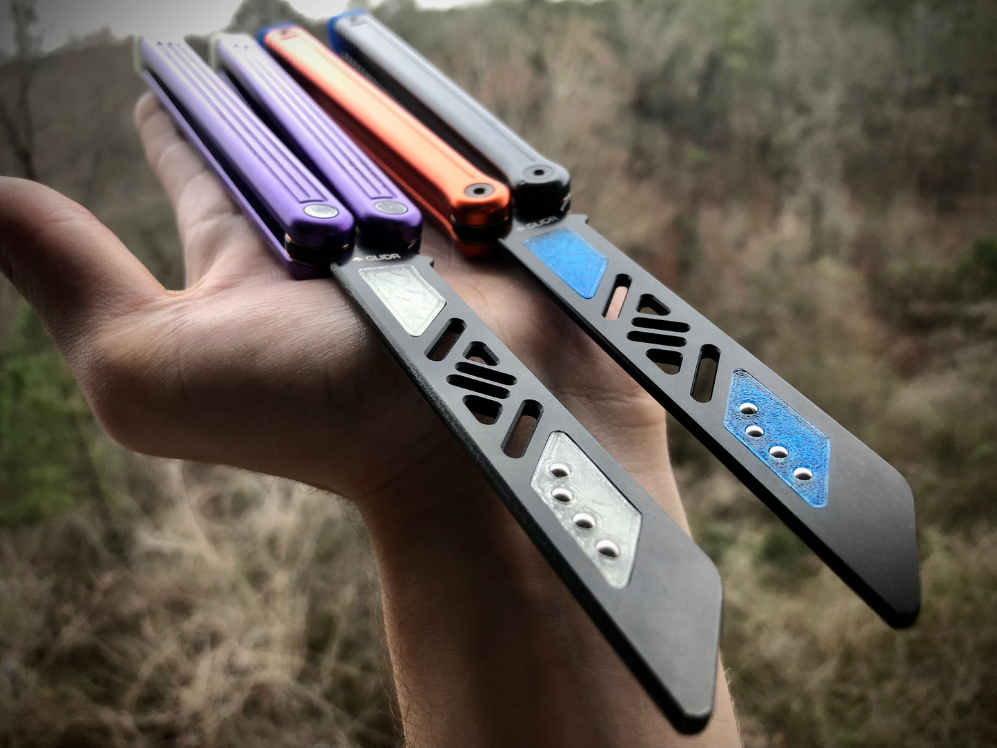 Reduce the handle bias and adjust the balance of your Glidr Arctic, Antarctic, and Bermuda balisong trainers with tungsten-weighted Zippy blade inserts and spacers featuring adjustable balance and positive jimping.