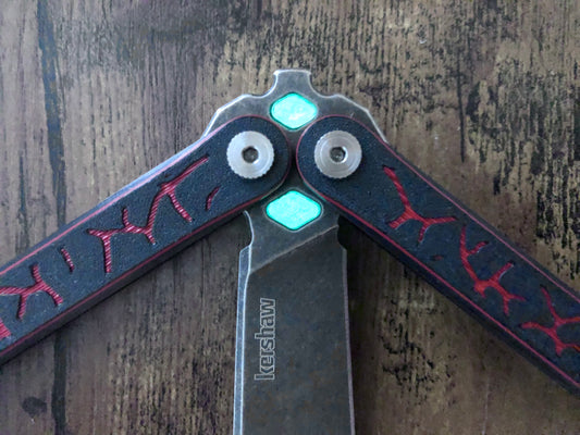 Improve the balance of your Kershaw Lucha balisong for flipping with Zippy mods: extension spacers with Jimping for the Kershaw Lucha and Flytanium Lucha, and the ZippyLucha handle mod with the high-performance Zippy bearing system.