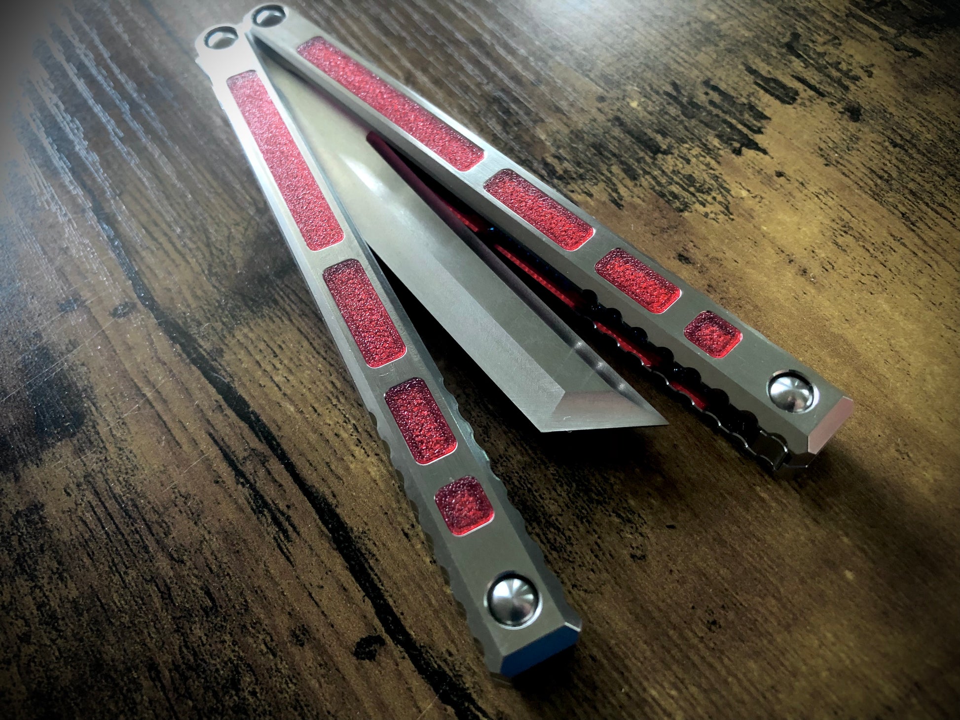 Modify the ergo, deepen the sound, and add a pop of color to your B.A. Balis Tesseract balisong with these polyurethane Zippy handle inlays.