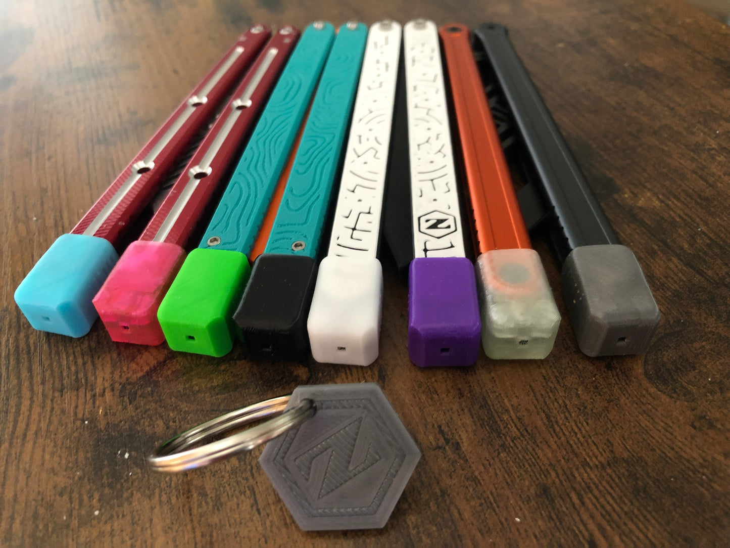 Protect your favorite balisong handles from concrete drops with the original Zippy handle caps. Weight caps to adjust the balance, slim caps for low-profile handle protection and grip for ladders, and LED caps for a light-up balisong experience. Mark your bite handle with the best bite markers on the market.