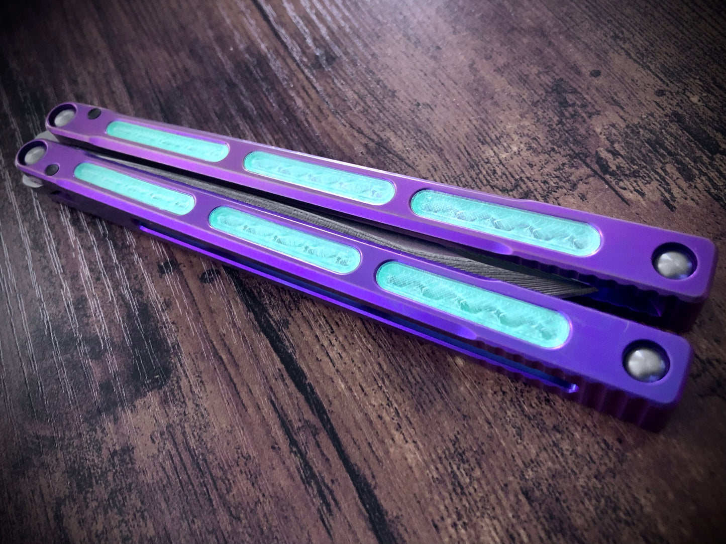 Zippy mods for the MachineWise Opus, Serif, Prysma, and SlifT v2 balisongs to change the balance, add grip, and eliminate the ring.