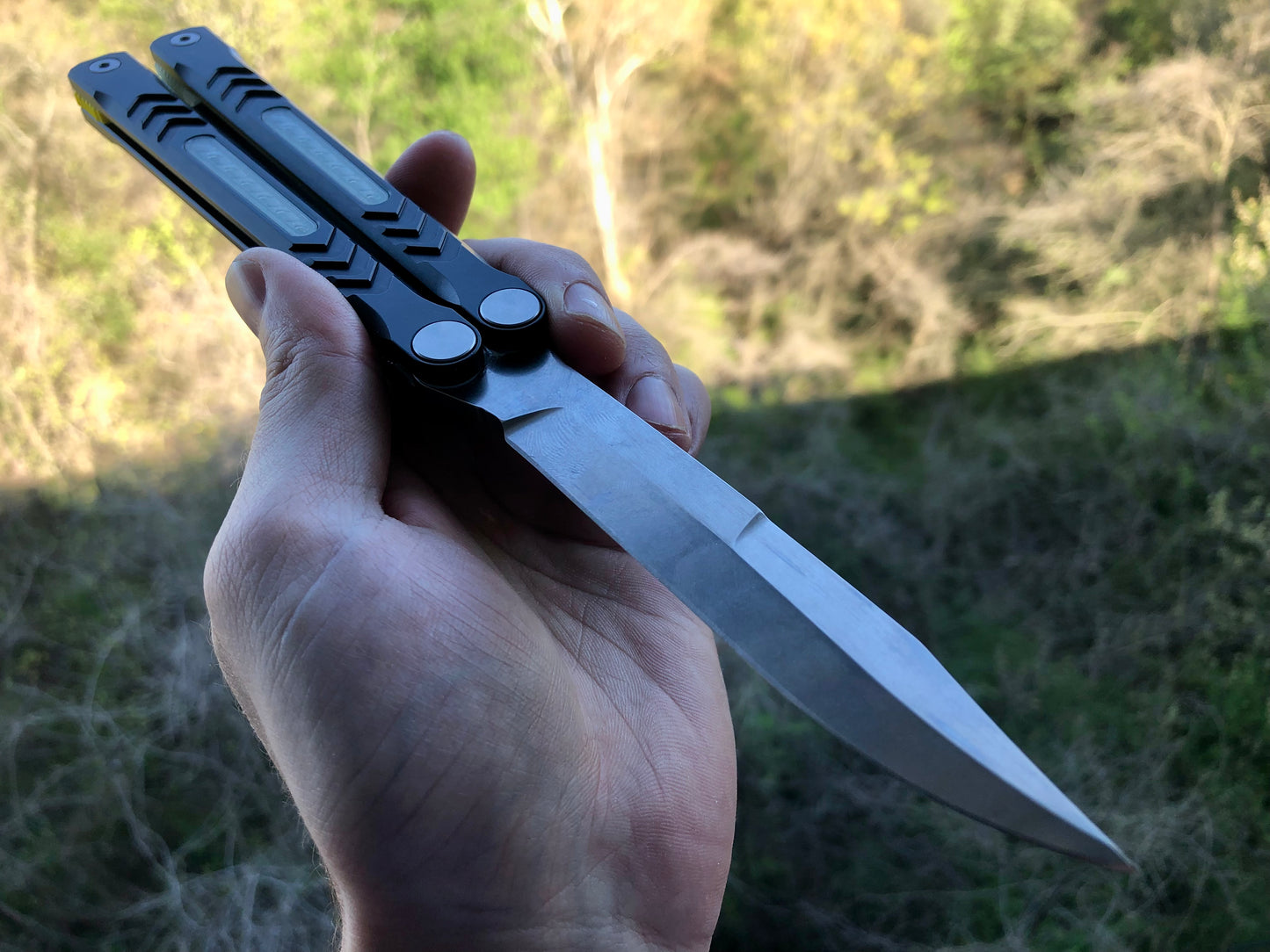 Reduce the handle bias and add grip to your Revo Nexus balisong with Zippy handle inlays and lightweight spacers featuring positive jimping.