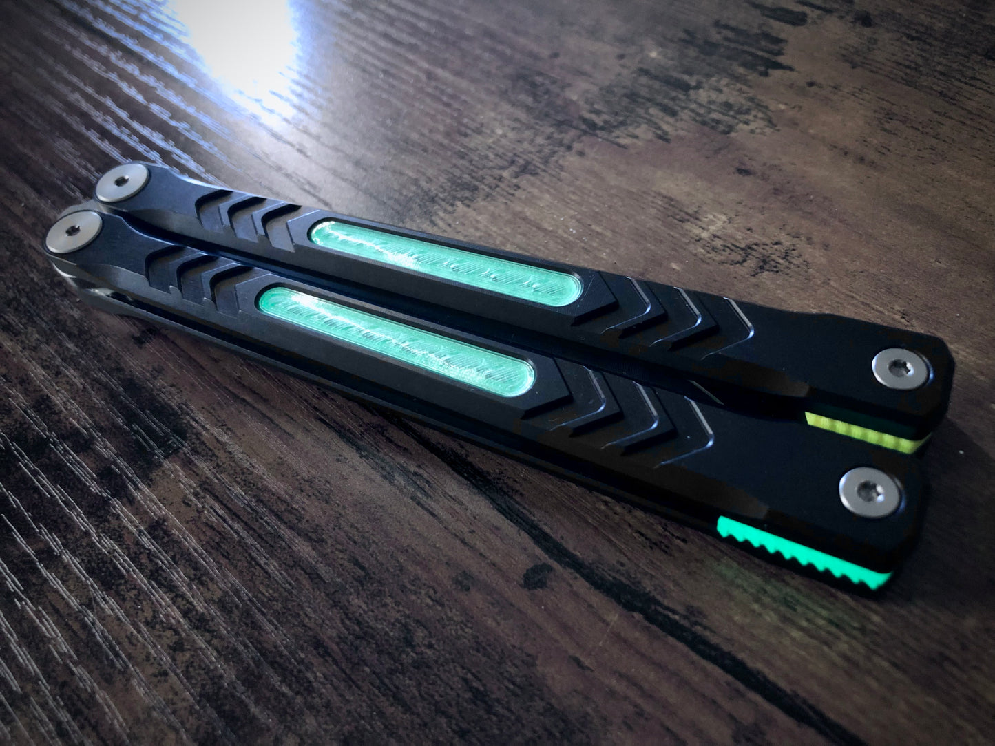 Reduce the handle bias and add grip to your Revo Nexus balisong with Zippy handle inlays and lightweight spacers featuring positive jimping.