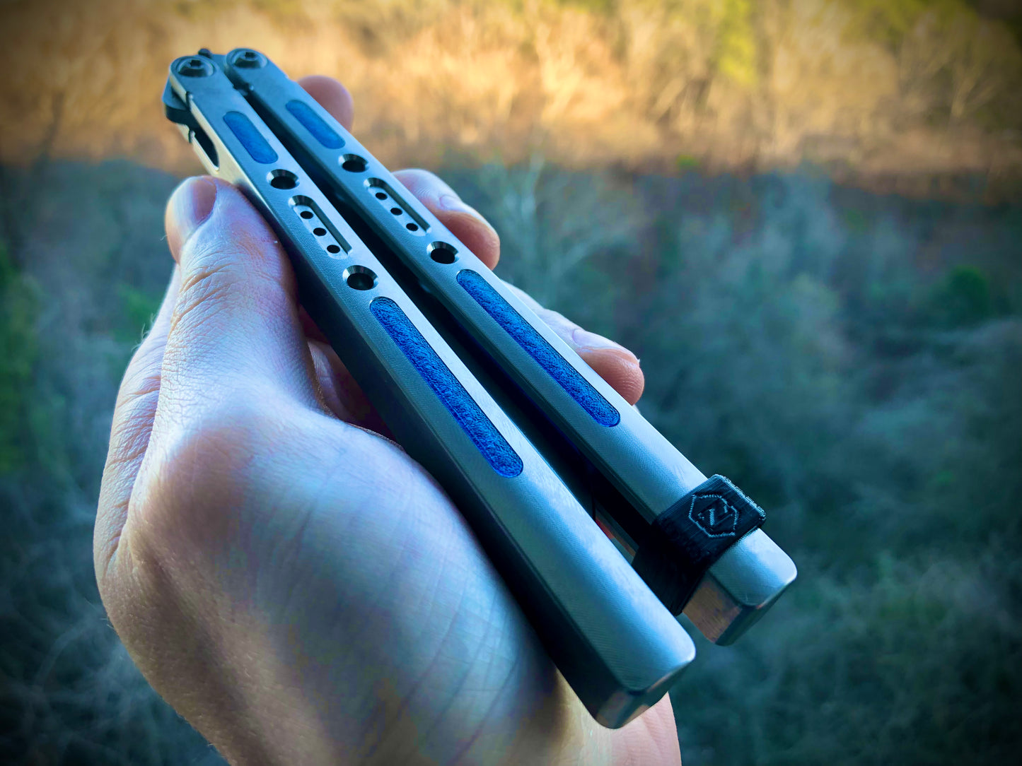 Polyurethane handle inlays for the Jimpy Designs Sentinel & Zentinel balisongs. These inlays modify grip, deepen sound, and add a pop of color.