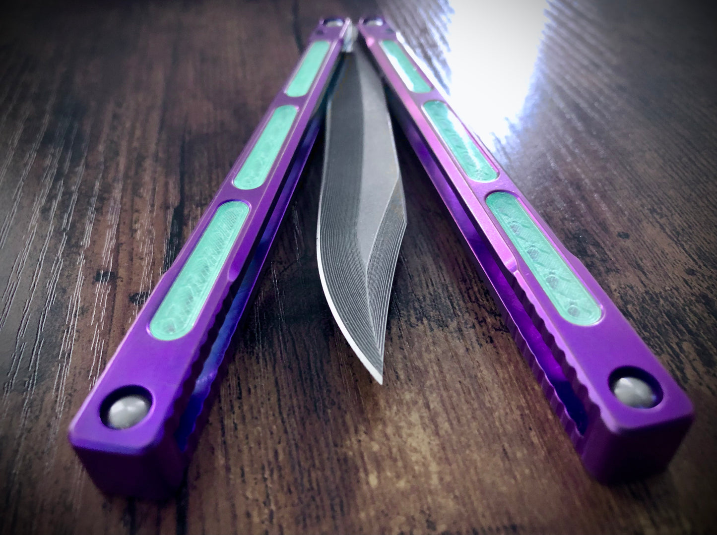 Zippy mods for the MachineWise Opus, Serif, Prysma, and SlifT v2 balisongs to change the balance, add grip, and eliminate the ring.