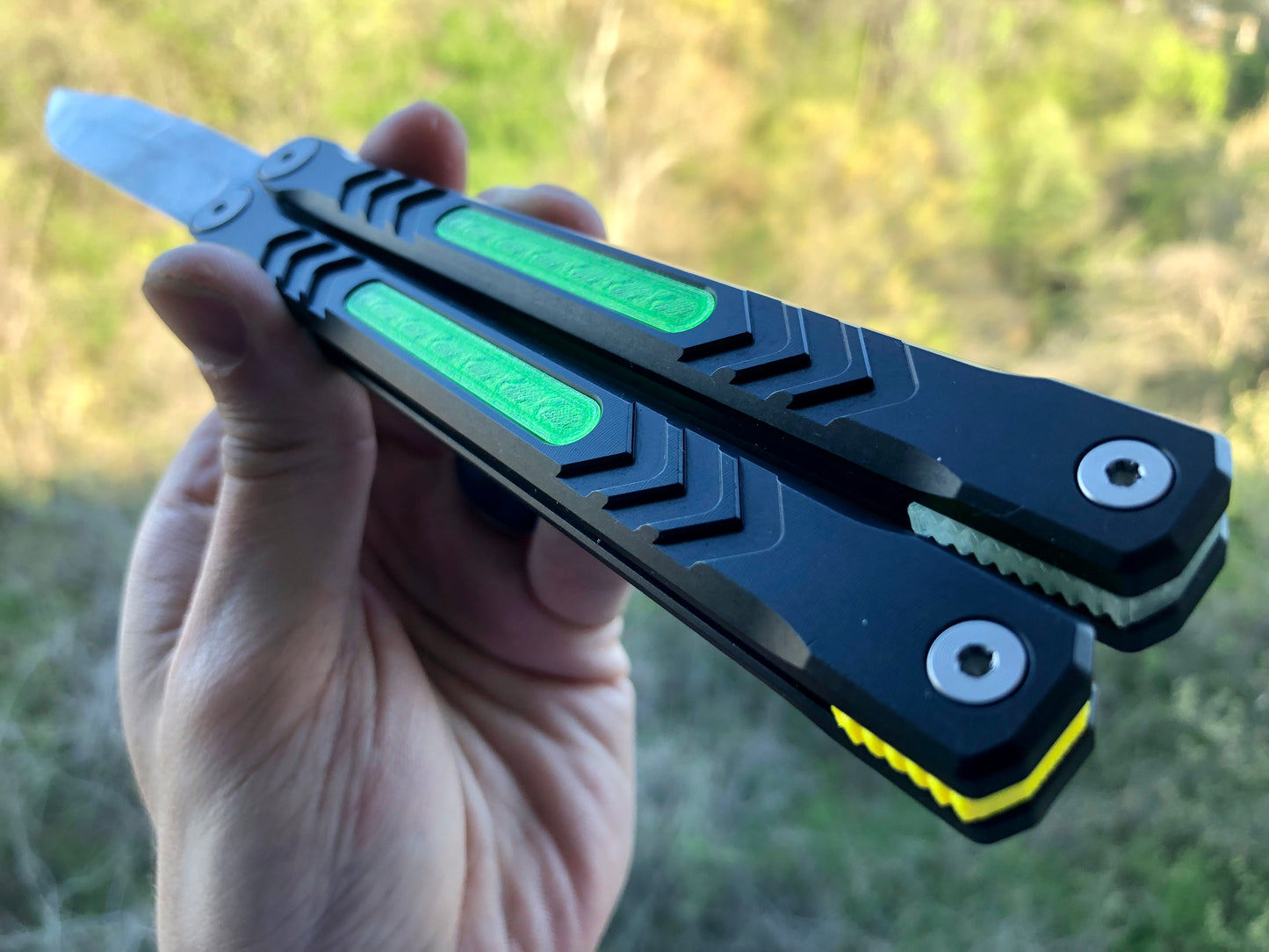 Reduce the handle bias and add grip to your Revo Nexus balisong with Zippy handle inlays and lightweight spacers featuring positive jimping.