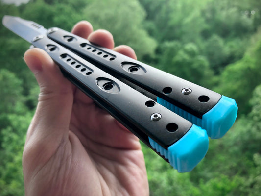 Reduce the handle bias and improve the flipping of your Ryworx Omeme balisong with Zippy extension spacers that feature adjustable balance and positive jimping.