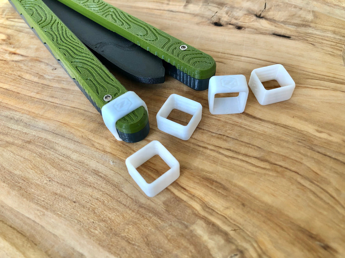 Protect your favorite balisong handles from concrete drops with the original Zippy handle caps. Weight caps to adjust the balance, slim caps for low-profile handle protection and grip for ladders, and LED caps for a light-up balisong experience. Mark your bite handle with the best bite markers on the market.