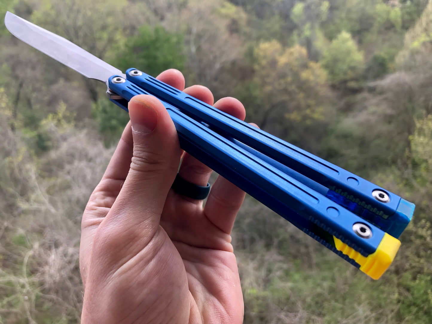 Adjust the balance, extend the handles, and add grip to your LDY balisong Cygnus and Orion flippers with Zippy extension spacers and handle inlays.