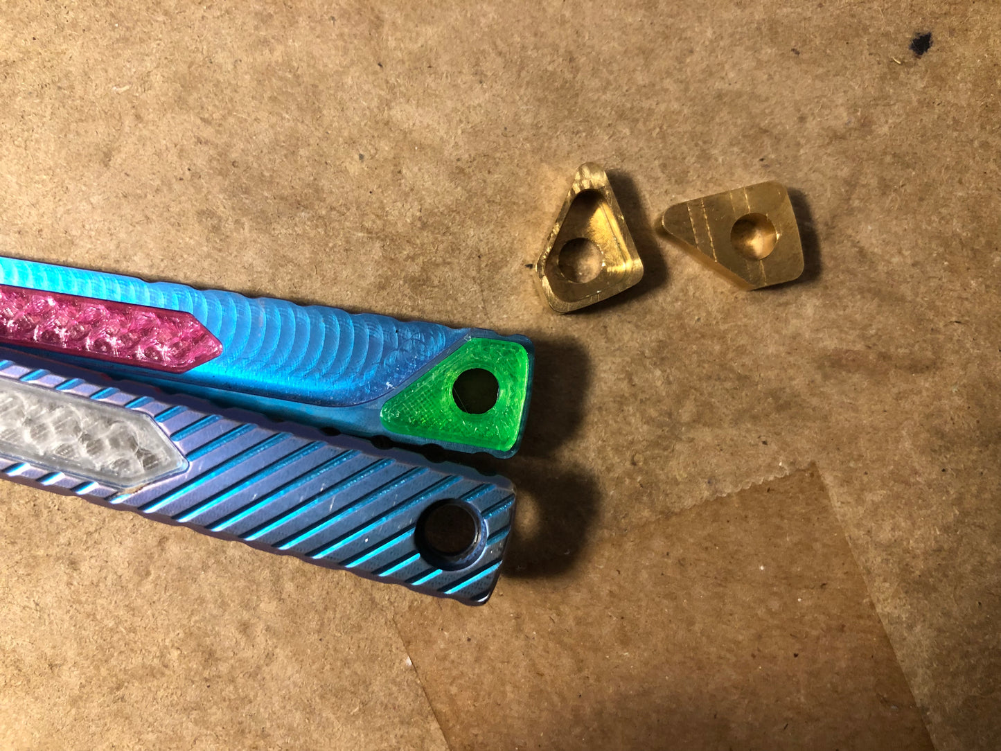 Zippy mods for the MachineWise Opus, Serif, Prysma, and SlifT v2 balisongs to change the balance, add grip, and eliminate the ring.