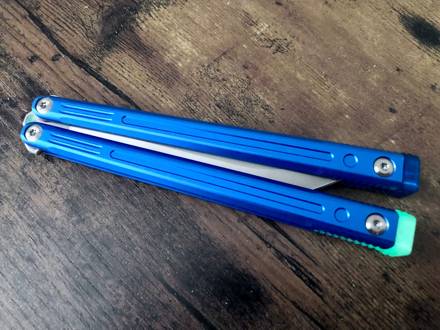 Adjust the balance, extend the handles, and add grip to your LDY balisong Cygnus and Orion flippers with Zippy extension spacers and handle inlays.