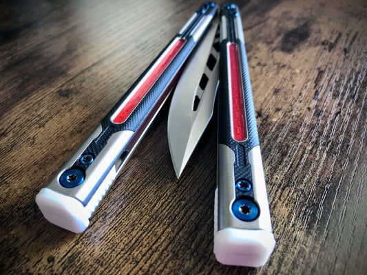 Adjust the balance, extend the handles, and add grip to your LDY balisong Cygnus and Orion flippers with Zippy extension spacers and handle inlays.