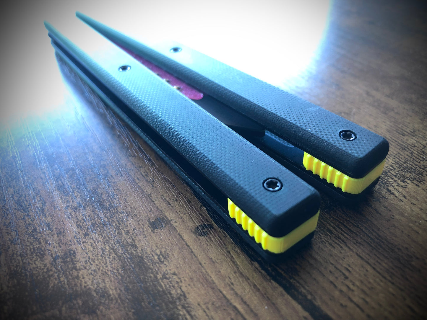 Reduce the handle bias and adjust the balance of your Glidr Arctic, Antarctic, and Bermuda balisong trainers with tungsten-weighted Zippy blade inserts and spacers featuring adjustable balance and positive jimping.
