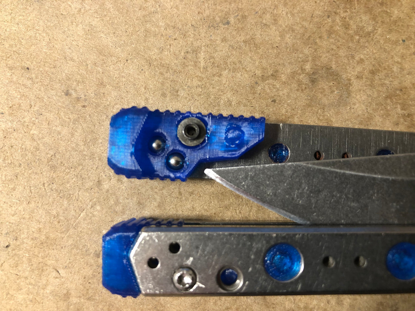 Improve the balance of your Kershaw Lucha balisong for flipping with Zippy mods: extension spacers with Jimping for the Kershaw Lucha and Flytanium Lucha, and the ZippyLucha handle mod with the high-performance Zippy bearing system.