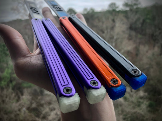 Reduce the handle bias and adjust the balance of your Glidr Arctic, Antarctic, and Bermuda balisong trainers with tungsten-weighted Zippy blade inserts and spacers featuring adjustable balance and positive jimping.