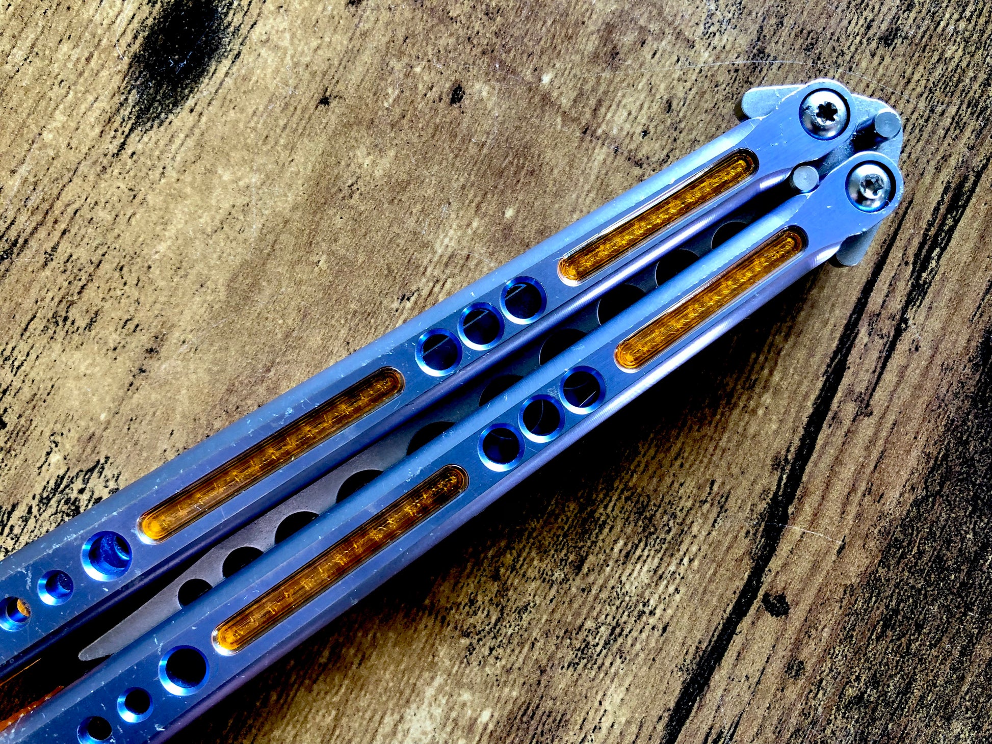 Deepen the sound, modify the grip, and add a pop of color to your HOM Prodigy Mod C balisong trainer with these polyurethane Zippy handle inlays.