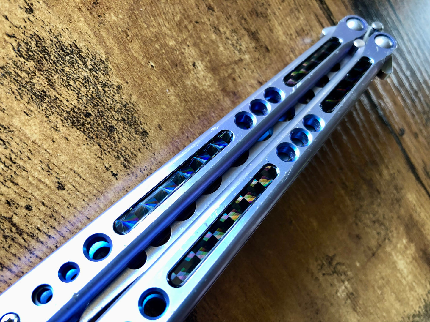 Deepen the sound, modify the grip, and add a pop of color to your HOM Prodigy Mod C balisong trainer with these polyurethane Zippy handle inlays.