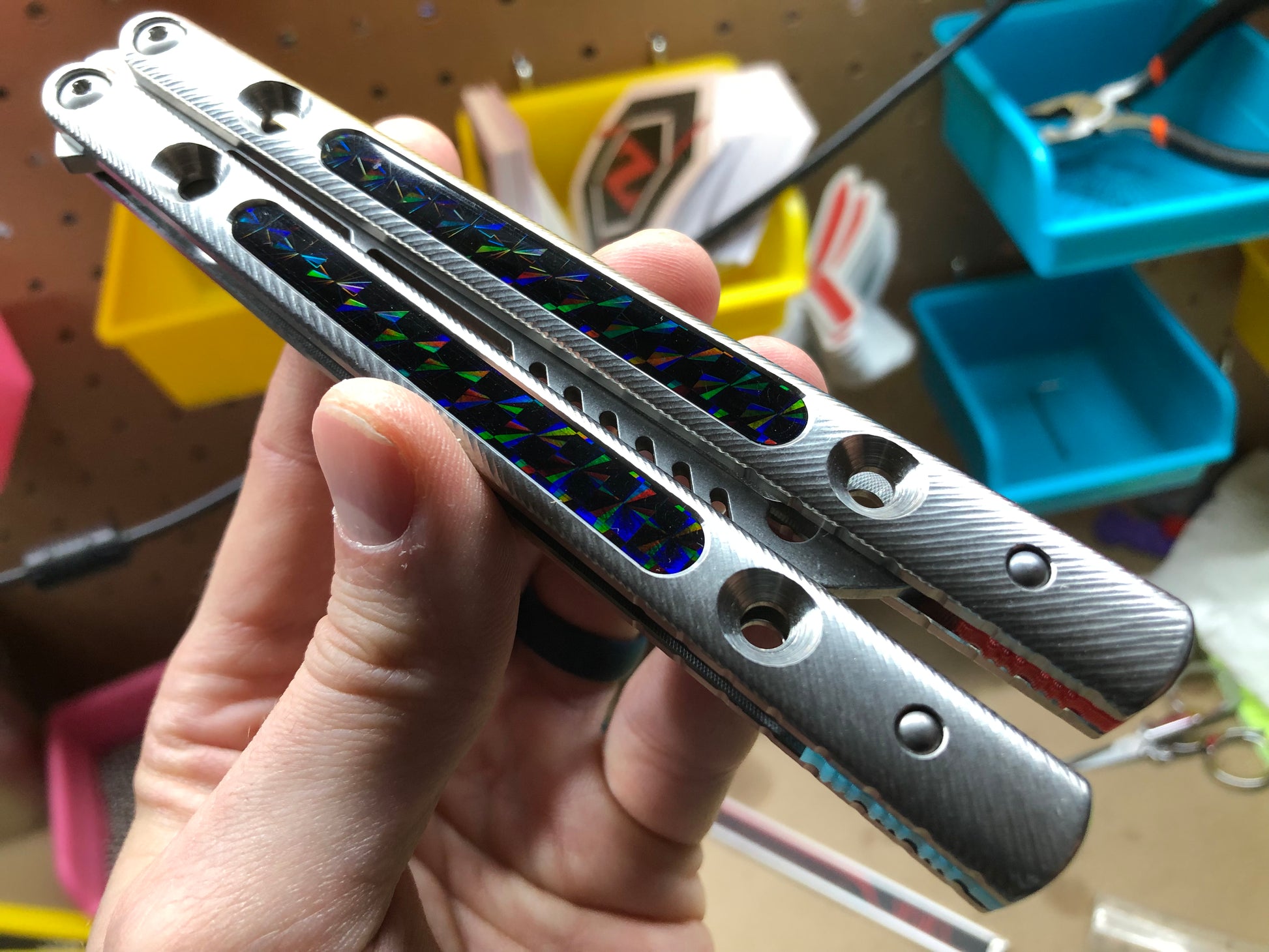 Zippy spacers reduce the handle bias and add positive jimping to your Squiggle Krake, while the inlays add grip and comfort. Individually, both spacers and the inlays eliminate ring and are designed to fit the titanium Squiggle handles for the Squid Industries Krake Raken balisong.