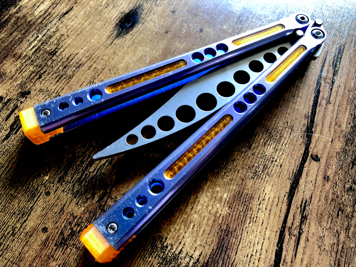 Deepen the sound, modify the grip, and add a pop of color to your HOM Prodigy Mod C balisong trainer with these polyurethane Zippy handle inlays.