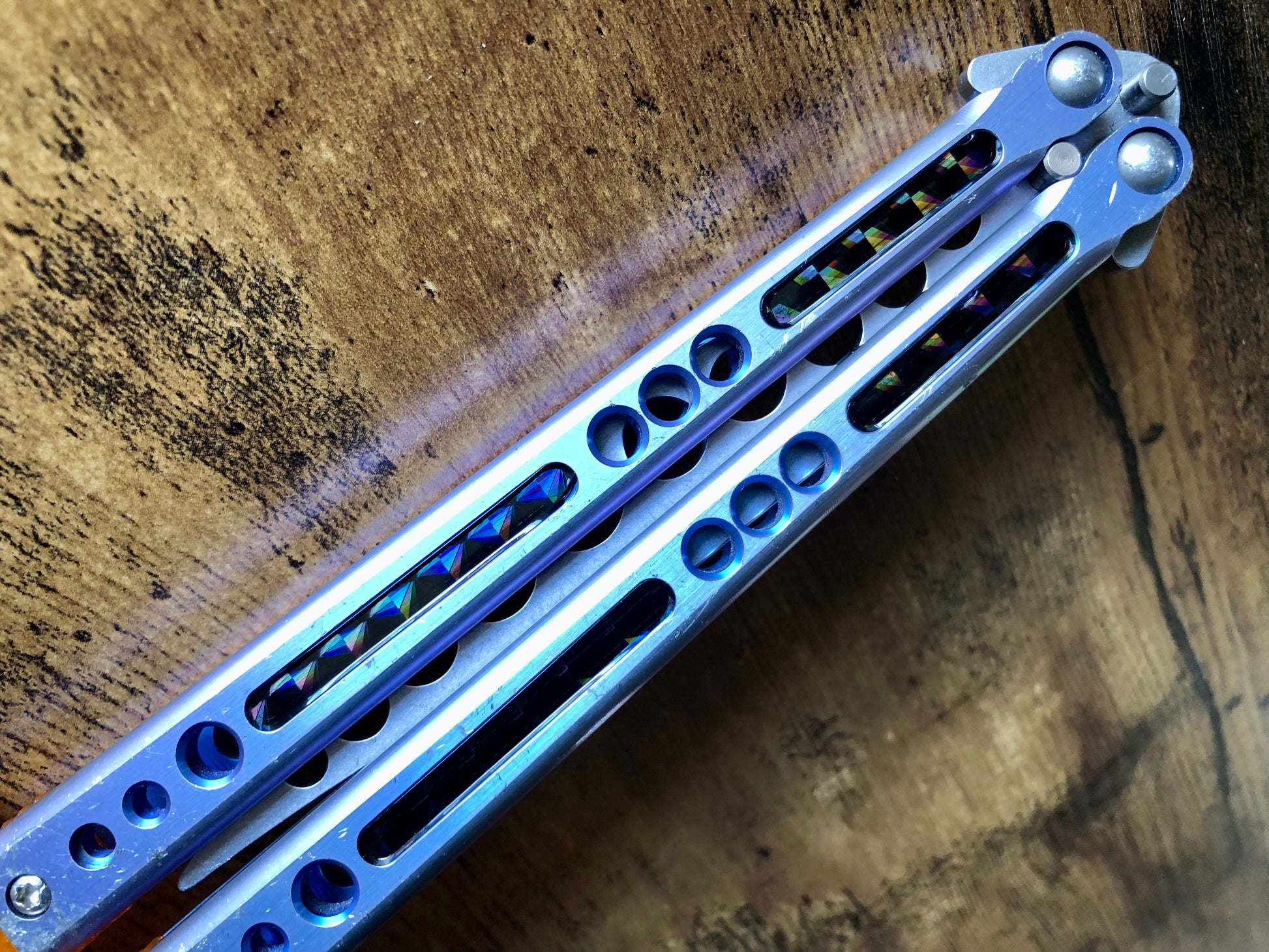 Deepen the sound, modify the grip, and add a pop of color to your HOM Prodigy Mod C balisong trainer with these polyurethane Zippy handle inlays.