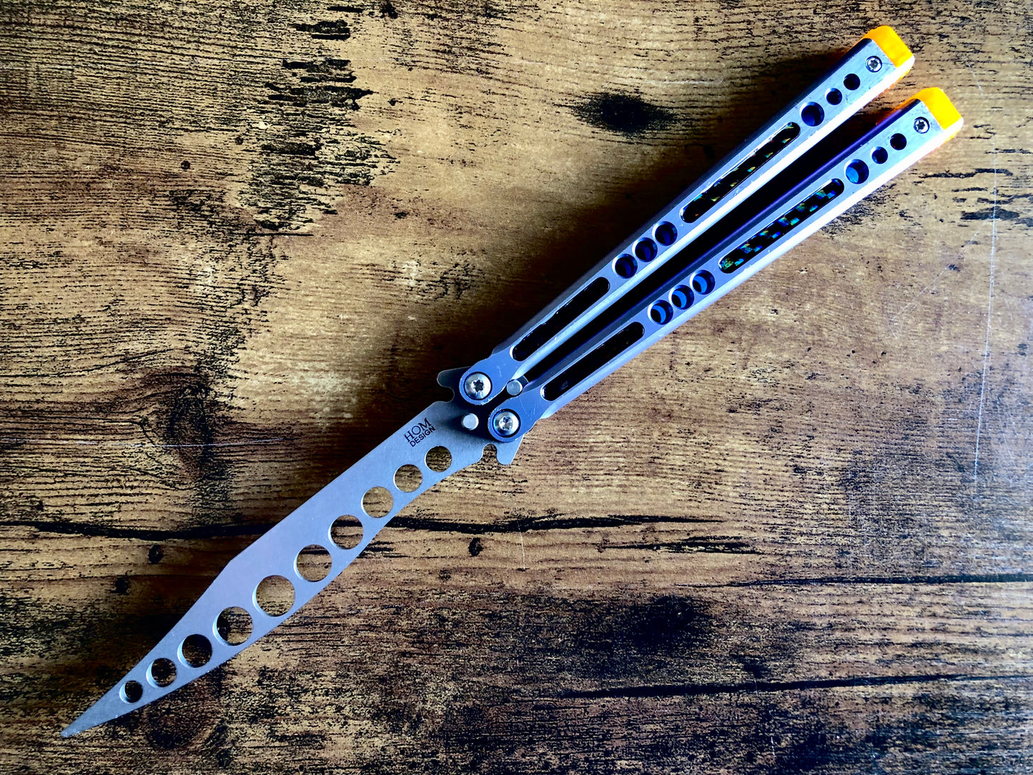 Deepen the sound, modify the grip, and add a pop of color to your HOM Prodigy Mod C balisong trainer with these polyurethane Zippy handle inlays.