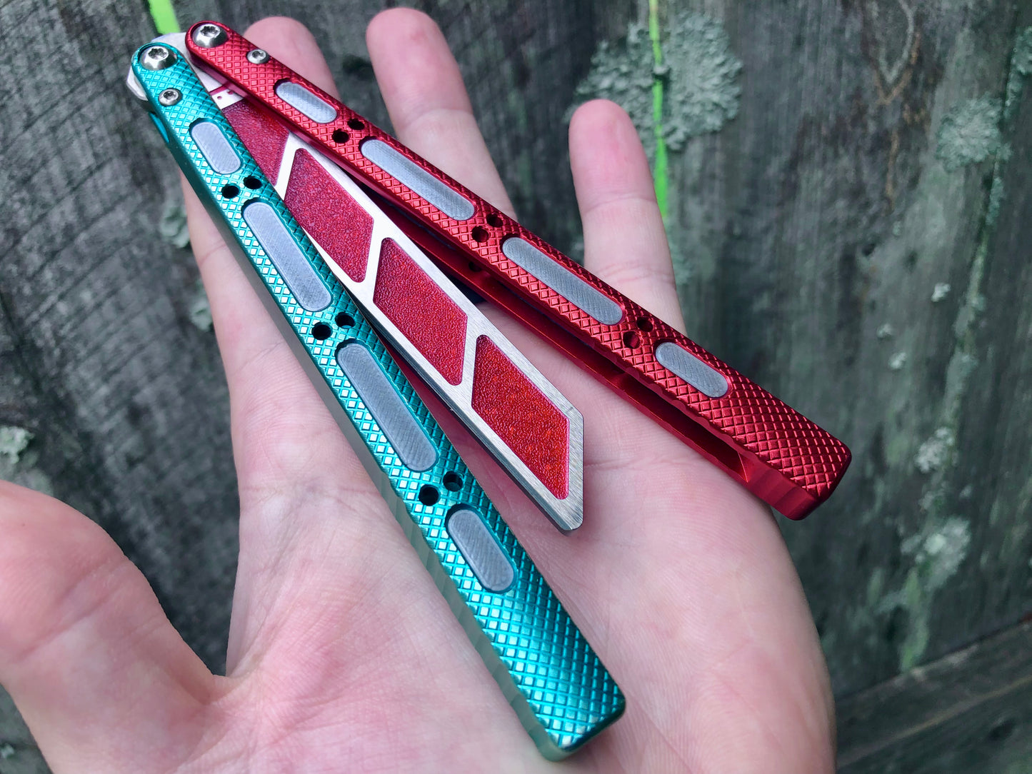 Add blade weight and a pop of color to your NRB Ultralight balisong trainer with these custom-made Zippy blade inserts. The inserts are made of a shatter-proof polyurethane with an edge lip, so they won't fall out on drops. The inserts enable you to modify the balance of your Ultralight and can be used to compensate for the added handle weight from the Zippy handle inlays.