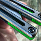 These Zippy spacers designed for the Squid Industries Hydro Balisong are made in-house from a rubbery, shatter-proof polyurethane. They add positive "sawtooth" jimping to the Hydro and are available as either full-length flush spacers for a more neutral balance, or handle extensions (with an adjustable tungsten weight system) to protect the handles from drops and increase momentum. A cosmetic blade insert is included.