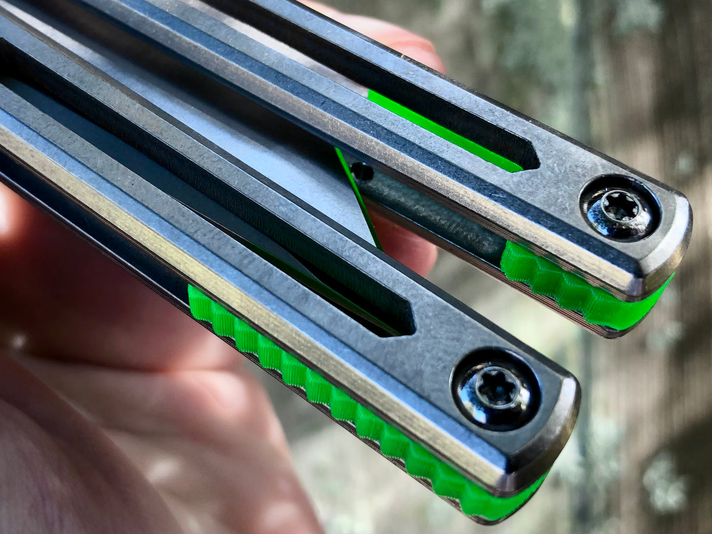 These Zippy spacers designed for the Squid Industries Hydro Balisong are made in-house from a rubbery, shatter-proof polyurethane. They add positive "sawtooth" jimping to the Hydro and are available as either full-length flush spacers for a more neutral balance, or handle extensions (with an adjustable tungsten weight system) to protect the handles from drops and increase momentum. A cosmetic blade insert is included.