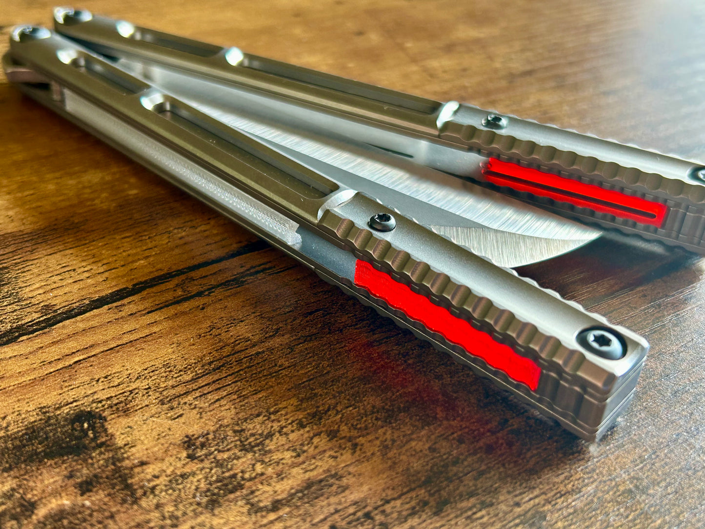 These ultra-lightweight Zippy speed channel inserts are custom-designed for the Andrew Myers Knife Works (AMKW) Aeon butterfly knife They add positive jimping to the Aeon for extra grip, deepen the sound, and dampen the ring.