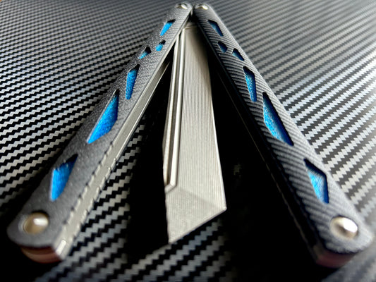 These cosmetic Zippy handle inlays are designed for the Maranza Zika butterfly knife and add a pop of color without changing the balance. The Maranza Zika balisong is a collaboration between AcidWRX and Ceroni Knives, and now it has aftermarket support from Zippy.