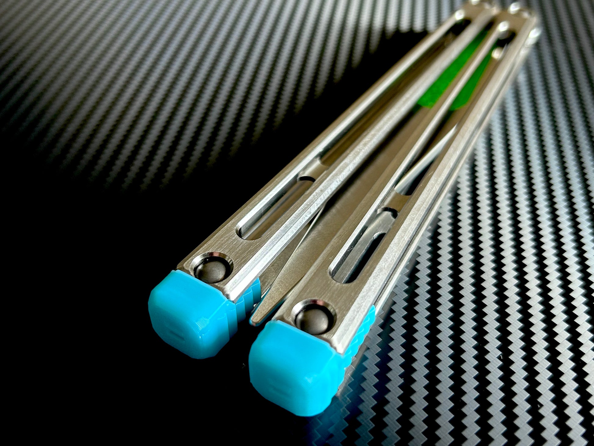 Designed and manufactured by Zippy, these are the stock spacers included with each Remshi Shino butterfly knife trainer. This listing allows you to customize your Remshi Shino with different spacer lengths and colors. These spacers are made in-house from a rubbery, shatter-proof polyurethane. They add grip and enable you to adjust the balance of your Shino. Choose from the stock OEM 5.75" Extension Spacers, or make your Shino shorter with either 5.69" Extensions or Flush Spacers.