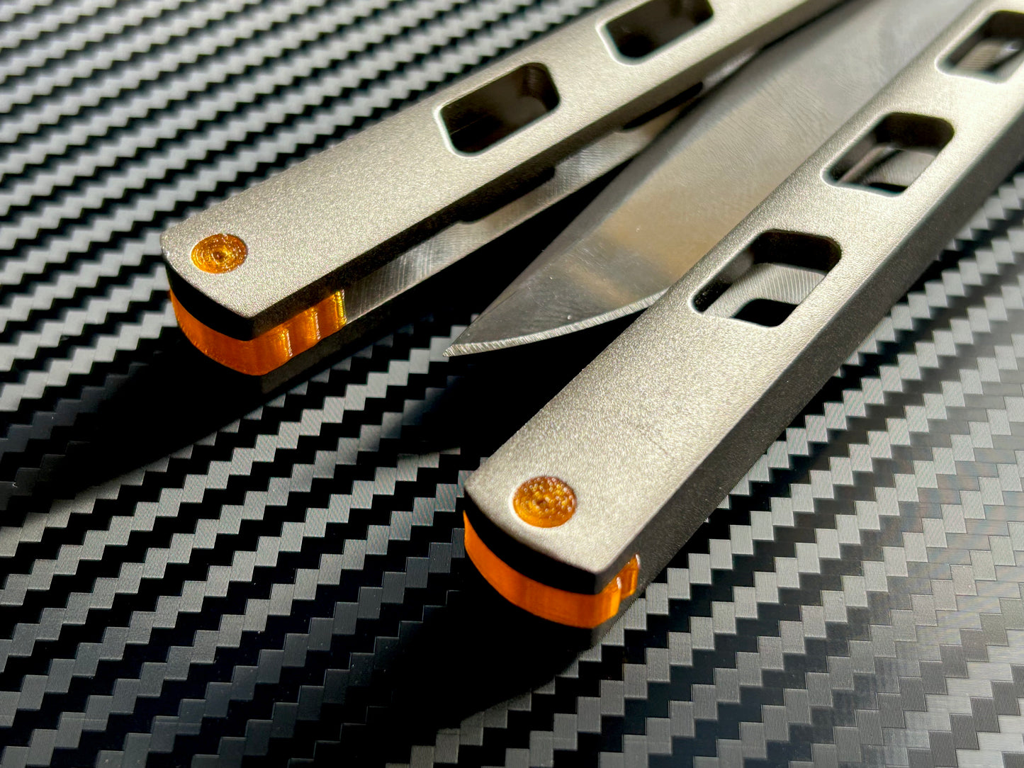 Modify the balance and ergo of your Cold Steel Arc Angel Aluminum butterfly knife with Zippy spacers, made in-house from a rubbery, shatter-proof polyurethane. The spacers add weight to improve the balance of the Arc Angel, and add positive "saw-tooth" jimping for extra grip. The spacers are available as either flush spacers, or handle extensions which add length and protect the handles from drops.