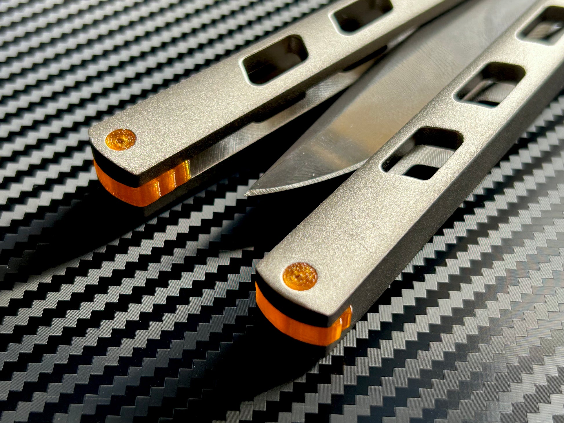 Modify the balance and ergo of your Cold Steel Arc Angel Aluminum butterfly knife with Zippy spacers, made in-house from a rubbery, shatter-proof polyurethane. The spacers add weight to improve the balance of the Arc Angel, and add positive "saw-tooth" jimping for extra grip. The spacers are available as either flush spacers, or handle extensions which add length and protect the handles from drops.