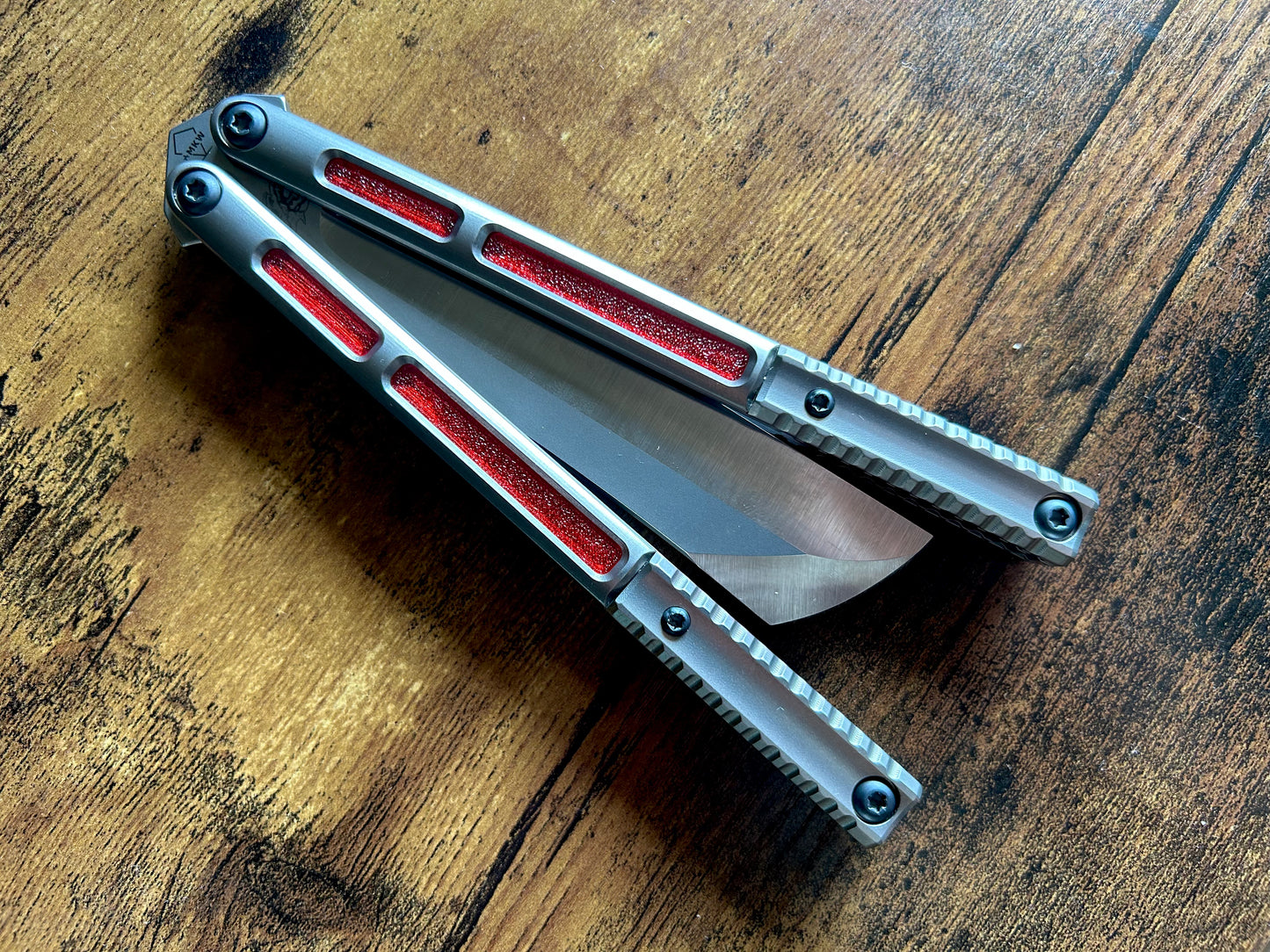 Deepen the sound and modify the aesthetic of your Andrew Myers Knife Works (AMKW) Aeon butterfly knife with these polyurethane Zippy handle inlays.