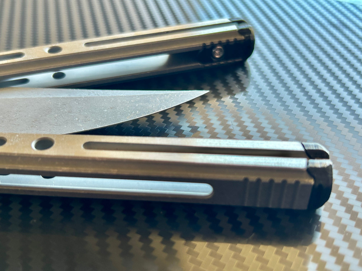 Extend and protect your handles with these Zippy spacers, custom-made for the Poikilo Blade PM3 (Halo) butterfly knife. The spacers are made from a shatter-proof polyurethane and protect your handles from drops while adding length. The spacers improve comfort. grip, and offer adjustable balance.