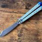 These Zippy spacers for the Benchmade Necron balisong are shatter-proof extensions that will protect your handles with no risk of cracking on hard-drops. They are available in 3x different lengths with removable tungsten weights for a more granular balance and length customization. They also offer positive jimping for extra grip, and install easily in just a few minutes (watch the assembly video above!). These spacers are a no-nonsense upgrade for the Necron.