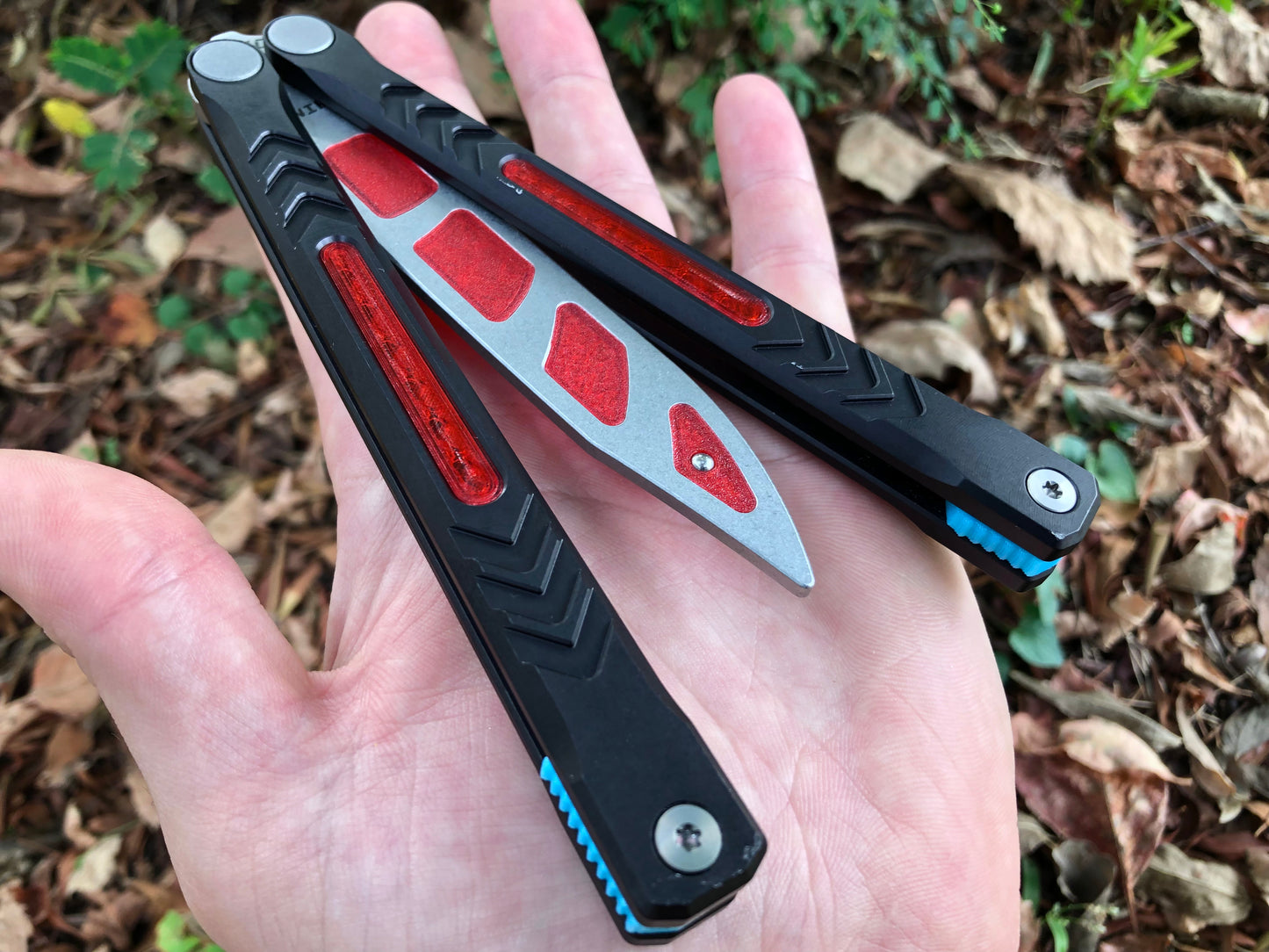 Reduce the handle bias and add grip to your Revo Nexus balisong with Zippy handle inlays and lightweight spacers featuring positive jimping.