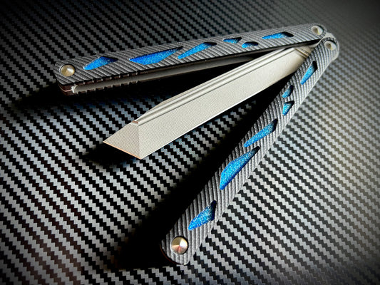These cosmetic Zippy handle inlays are designed for the Maranza Zika butterfly knife and add a pop of color without changing the balance. The Maranza Zika balisong is a collaboration between AcidWRX and Ceroni Knives, and now it has aftermarket support from Zippy.
