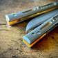 Modify the balance and ergo of your EPS Wraith Balisong with Zippy spacers, made in-house from a rubbery, shatter-proof polyurethane. Compatible with both G10 and Titanium variants. The spacers add positive "saw-tooth" jimping to the Wraith and include a tungsten weight system for adjustable balance. The spacers are available as either full-length flush spacers, or handle extensions which add length and protect the handles from drops.