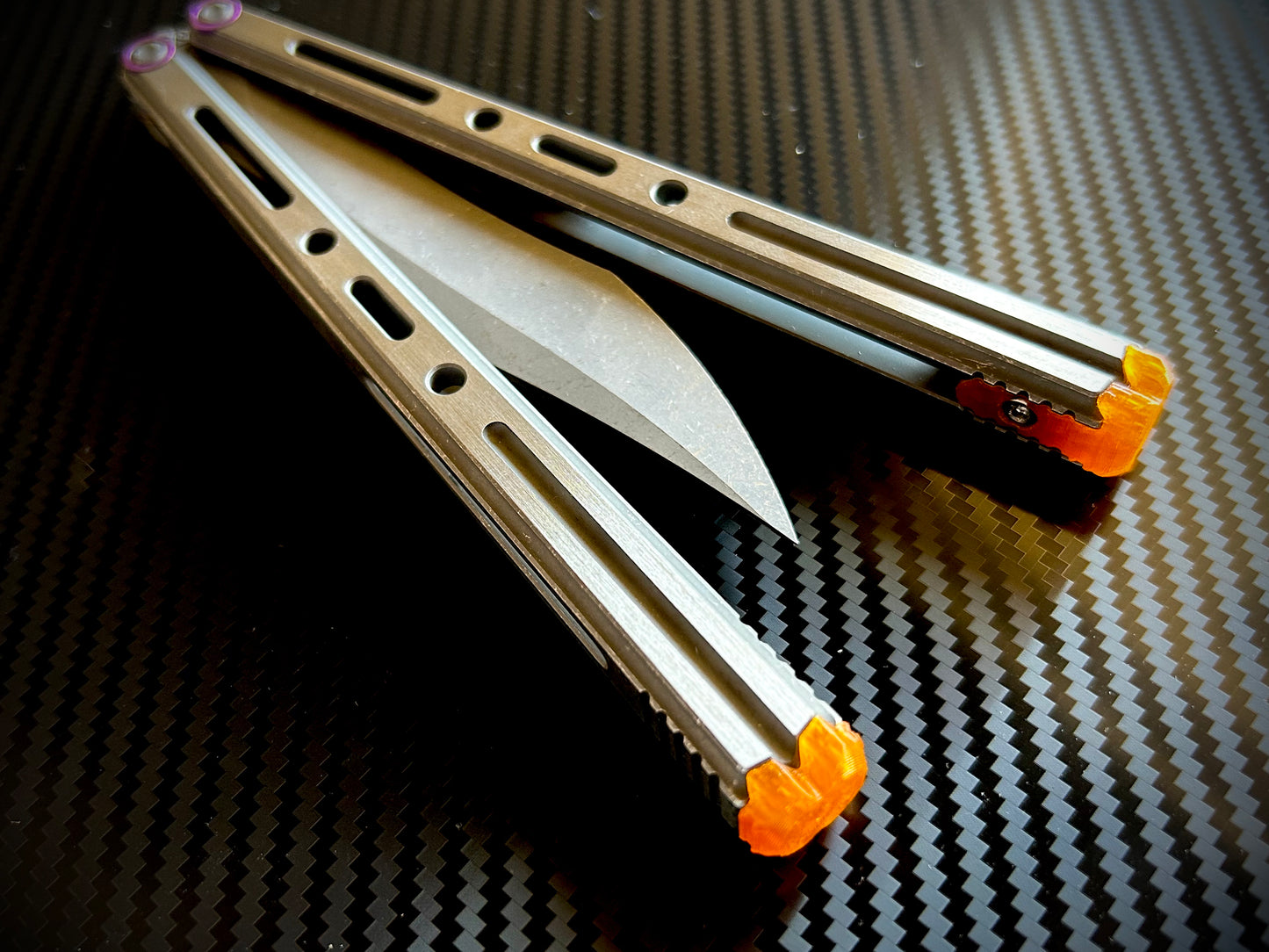 Extend and protect your handles with these Zippy spacers, custom-made for the Poikilo Blade PM3 (Halo) butterfly knife. The spacers are made from a shatter-proof polyurethane and protect your handles from drops while adding length. The spacers improve comfort. grip, and offer adjustable balance.