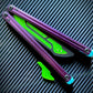 These Zippy spacers and blade inserts designed for the Nabalis Impulse butterfly knife trainer are made from a shatter-proof polyurethane. The spacers extend and protect the handles, feature positive jimping, and enable adjustable balance with up to 3x removable tungsten weights per spacer. The blade inserts increase momentum and enable you to adjust the balance with the optional tungsten-weighted tip insert.