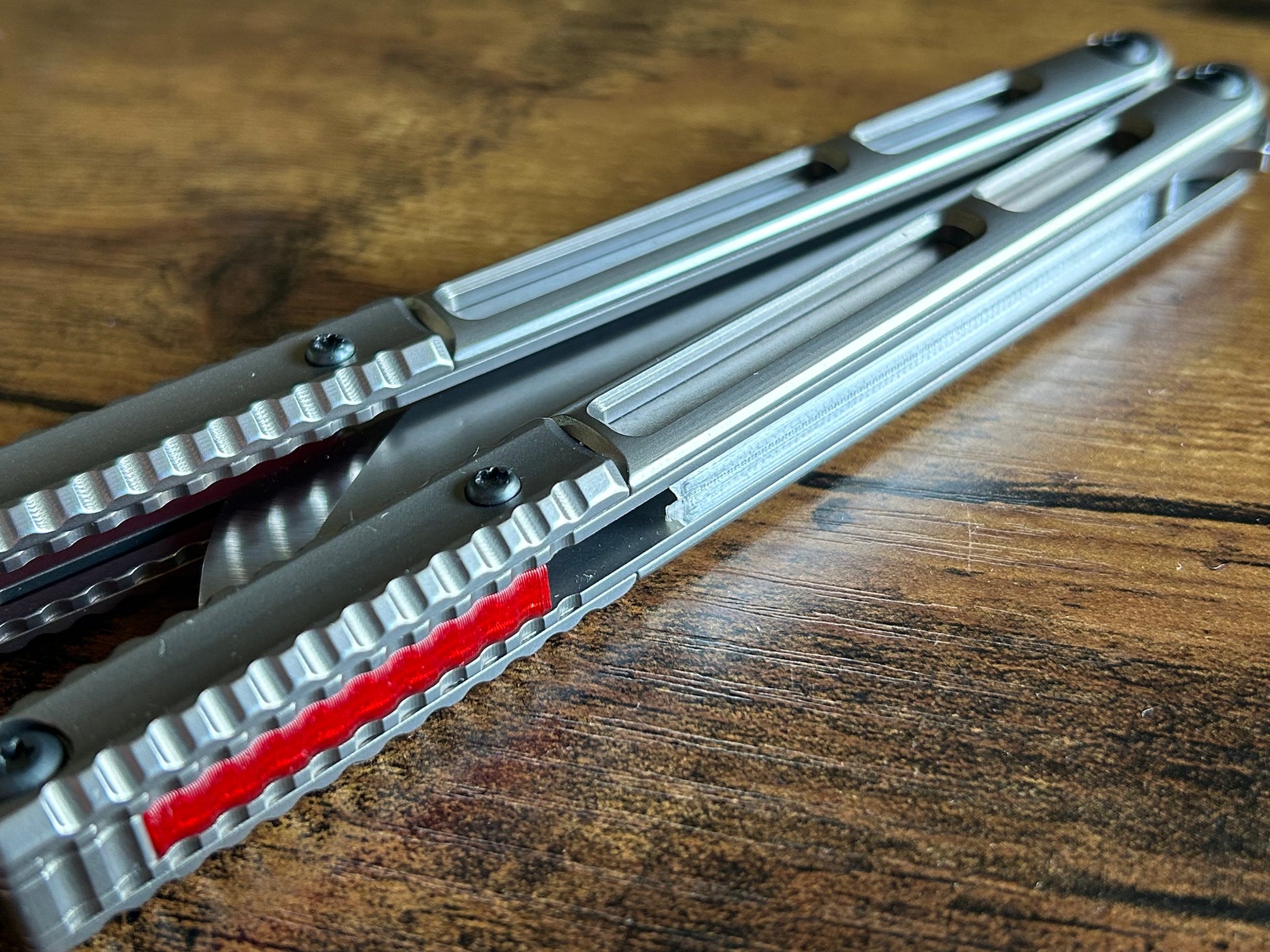 These ultra-lightweight Zippy speed channel inserts are custom-designed for the Andrew Myers Knife Works (AMKW) Aeon butterfly knife They add positive jimping to the Aeon for extra grip, deepen the sound, and dampen the ring.