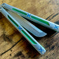 Designed and manufactured by Zippy, these are the OEM spacers and inlays included with each Bxndxge Stitch-R balisong. This listing allows you to customize your Bxndxge Stitch-r with different colors. These mods are made in-house from a rubbery, shatter-proof polyurethane.