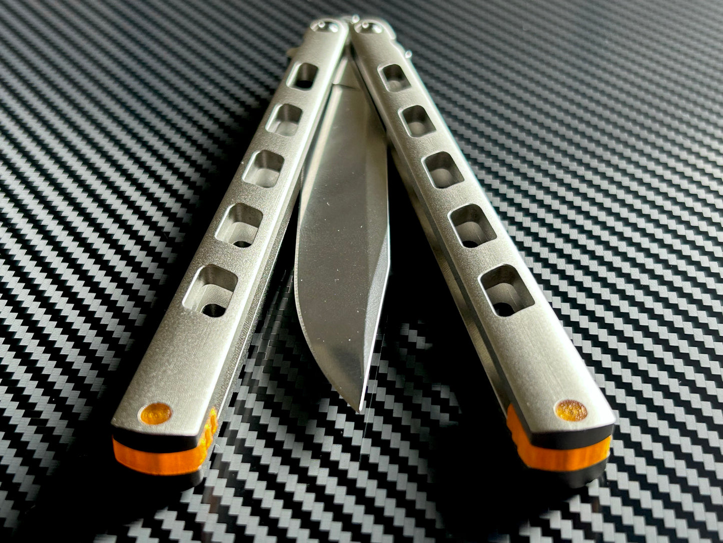 Modify the balance and ergo of your Cold Steel Arc Angel Aluminum butterfly knife with Zippy spacers, made in-house from a rubbery, shatter-proof polyurethane. The spacers add weight to improve the balance of the Arc Angel, and add positive "saw-tooth" jimping for extra grip. The spacers are available as either flush spacers, or handle extensions which add length and protect the handles from drops.