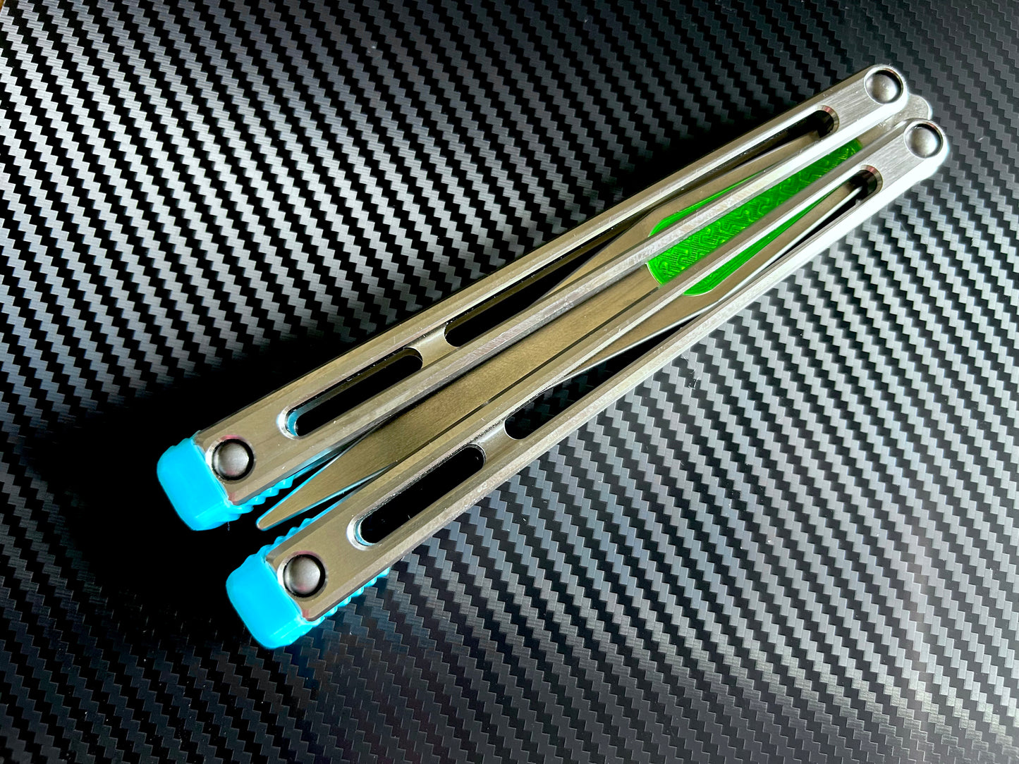 Designed and manufactured by Zippy, these are the stock spacers included with each Remshi Shino butterfly knife trainer. This listing allows you to customize your Remshi Shino with different spacer lengths and colors. These spacers are made in-house from a rubbery, shatter-proof polyurethane. They add grip and enable you to adjust the balance of your Shino. Choose from the stock OEM 5.75" Extension Spacers, or make your Shino shorter with either 5.69" Extensions or Flush Spacers.