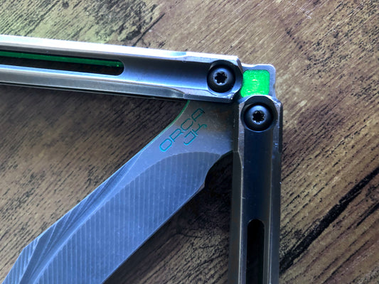 Add a pop of color and silence the ring of your JK Design Orca v2 balisong with these Zippy inlays. This mod consists of tang inlays, speed channel inserts, and "pivot plugs" which fill the bores at the base of the handles. The inlays are made in-house from a rubbery polyurethane and won't pop out on drops