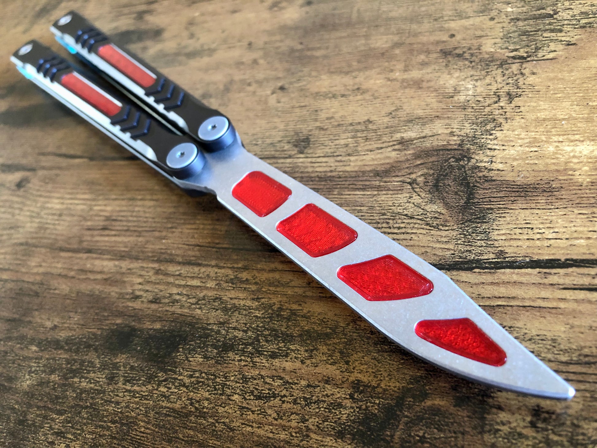 Modify the balance of your Revo Nexus balisong trainer with this custom-made Zippy balance mod. These inserts add blade weight for a more neutral balance profile. The inserts are made from a shatter-proof polyurethane and won't fall out on drops.