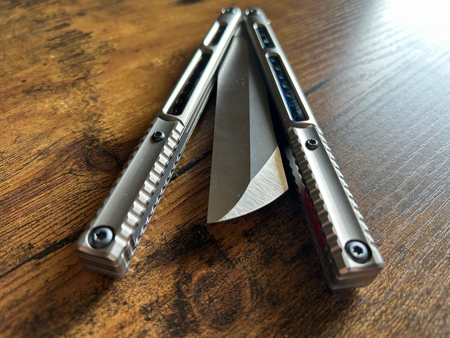 Deepen the sound and modify the aesthetic of your Andrew Myers Knife Works (AMKW) Aeon butterfly knife with these polyurethane Zippy handle inlays.