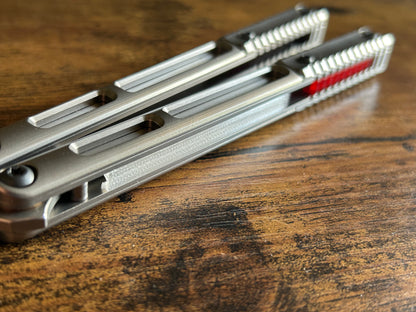 These ultra-lightweight Zippy speed channel inserts are custom-designed for the Andrew Myers Knife Works (AMKW) Aeon butterfly knife They add positive jimping to the Aeon for extra grip, deepen the sound, and dampen the ring.